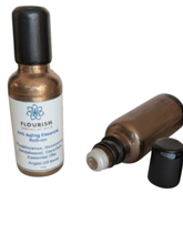 Load image into Gallery viewer, Anti Aging Essence Roll On 1 oz